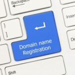 Business owner building a professional website using GoDaddy website services with verified coupon code deals for hosting, domains, and online growth