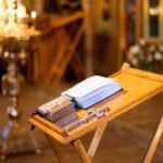 Church ministry leaders reviewing Christian education resources, Bible study materials, and church supplies with Christianbook coupon code savings opportunities