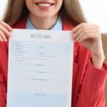 Professional job seeker using My Perfect Resume AI Resume Builder while searching for verified coupon codes and resume writing discounts online